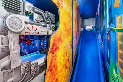 Slide into bedtime in a room built for adventure