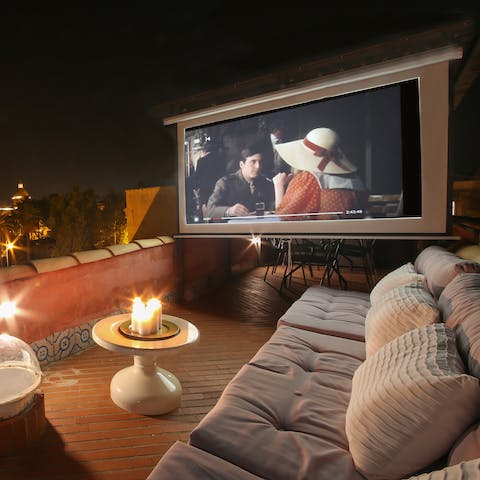 Watch your favourite films from the private rooftop cinema – we recommend Cinema Paradiso