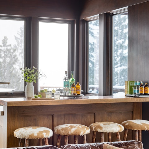 Fix yourself an old fashioned at the sleek wet bar