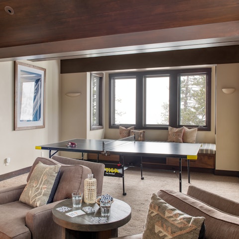 Play a few rounds of ping pong or shoot your shot on the shuffleboard table