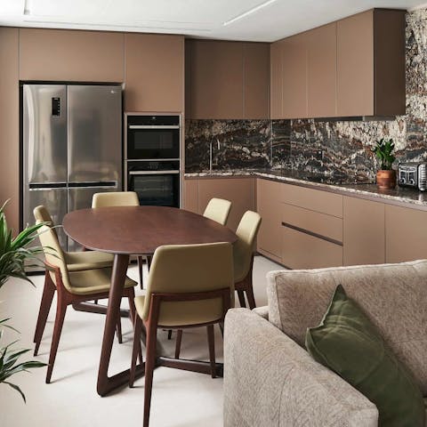Cook, dine and relax amongst the apartment's stunning interiors