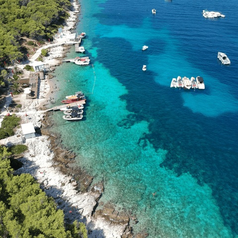 Pack a beach bag and explore the stunning coast of Hvar