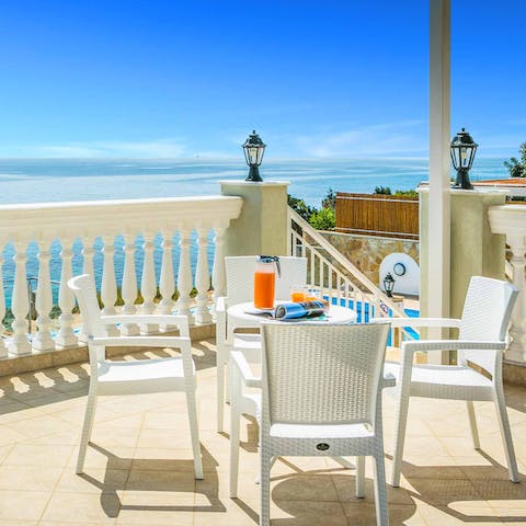 Sip a fresh juice on the sun-flooded terrace