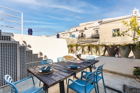 Dine alfresco among Noto's baroque rooftops under open skies
