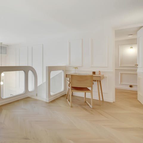 Relax or work from the spacious mezzanine area when staying in the City of Light