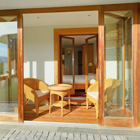 Wake up to sunshine and snow-capped peaks on the glass-fronted terrace in the main bedroom