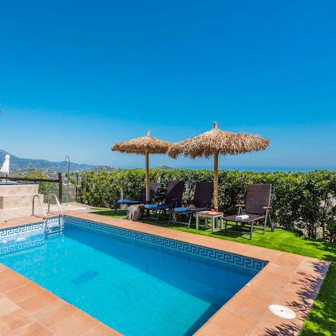 Stretch out on the poolside loungers with your holiday read, under the shade of the parasol