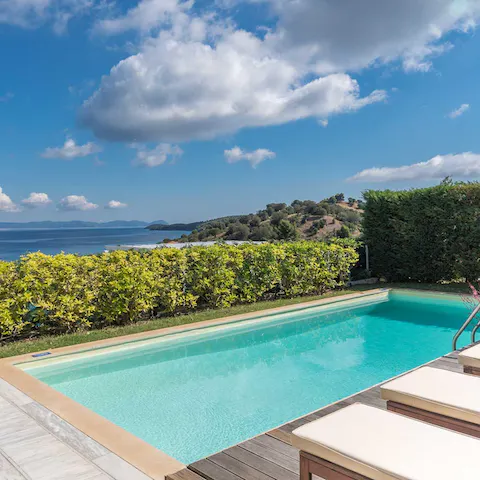 Lay out on the poolside loungers and take in the view