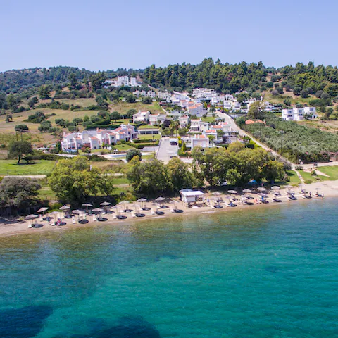 Treat yourself to relaxing days by the water at the resort's private beach