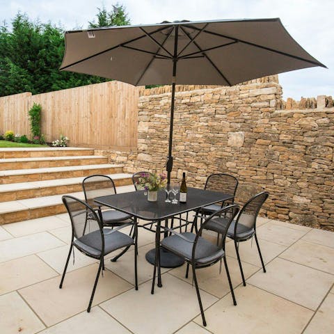 End the day with sundowners in the private garden