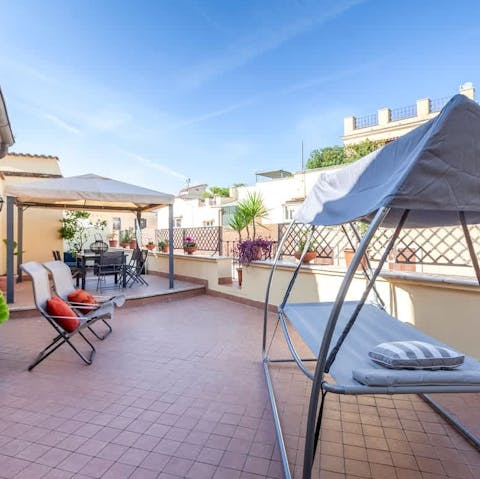 Toast the day's end from the rooftop, private terrace