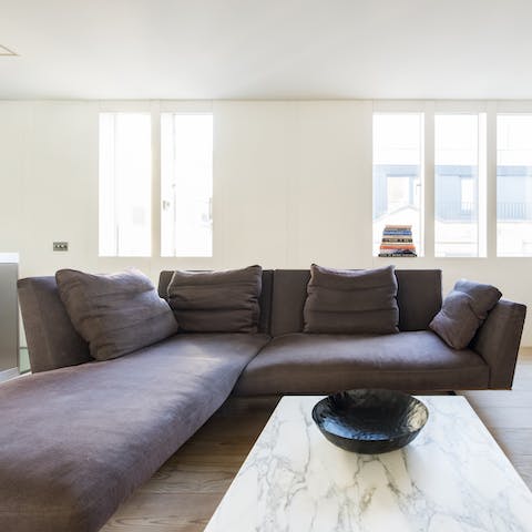 Begin your mornings with a strong cup of coffee on the modern L-shaped couch