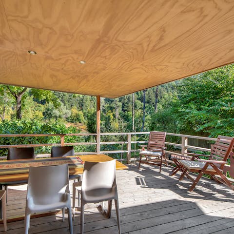 Gather on the covered terrace for your morning coffee