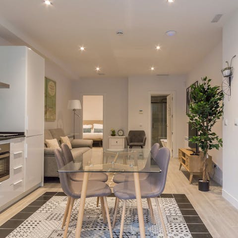 Enjoy some huevos rotos at the dining table