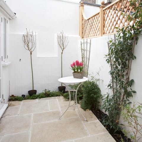 Enjoy a morning coffee in the courtyard garden