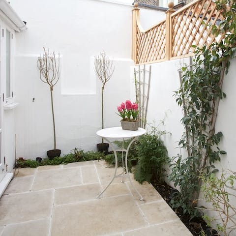 Enjoy a morning coffee in the courtyard garden