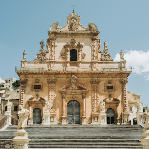 Begin your stay in Sicily with a scenic drive to Modica