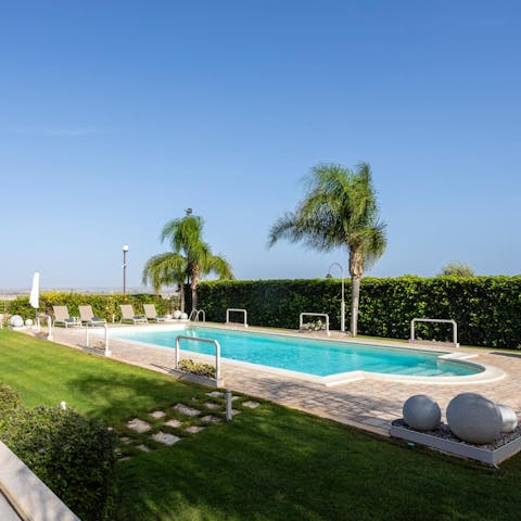 Savour total relaxation while lounging by the pool