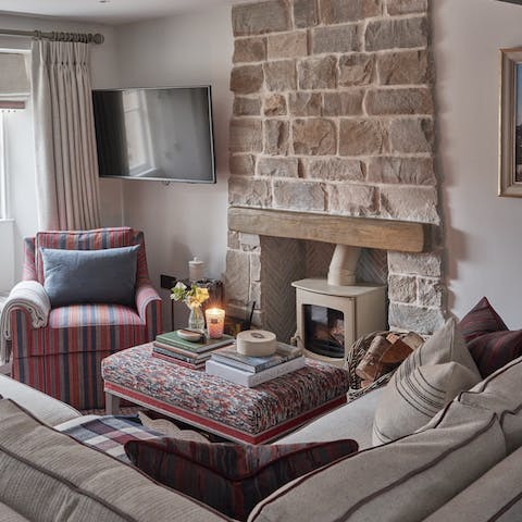 Light the fire and enjoy the warmth and comfort of the living room