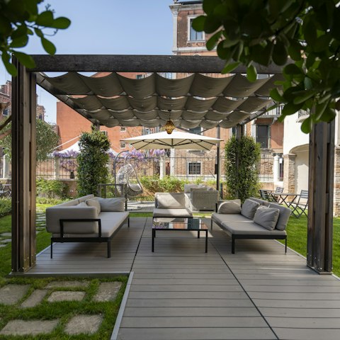 Enjoy an Aperol Spritz in the communal courtyard garden