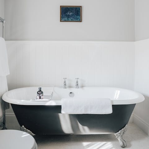 Relax in the claw-foot tub after a day of hiking