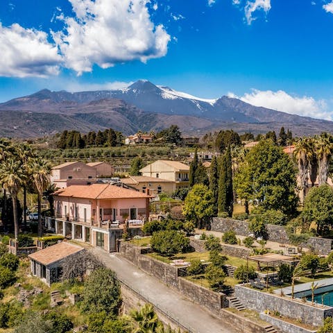 Follow hiking trails around the base of Mount Etna