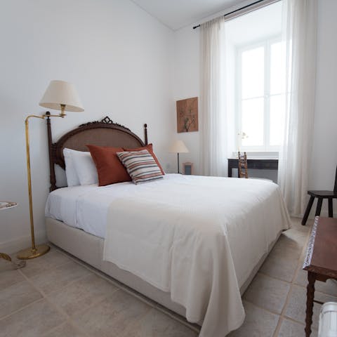 Get a restful night's sleep in the charming bedroom