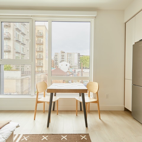 Work remotely or enjoy a bite to eat at the dining table