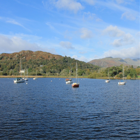 Walk twenty minutes to Lake Windermere's pier and hop on a boat
