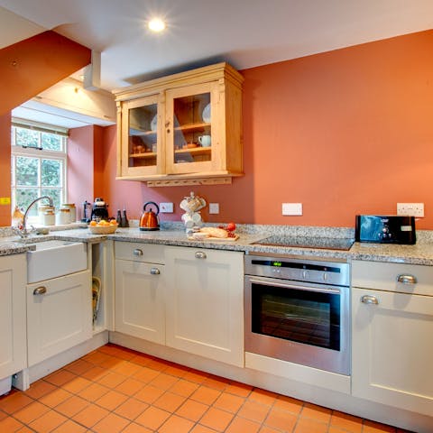 Rustle up some hearty British fare in the fully equipped kitchen