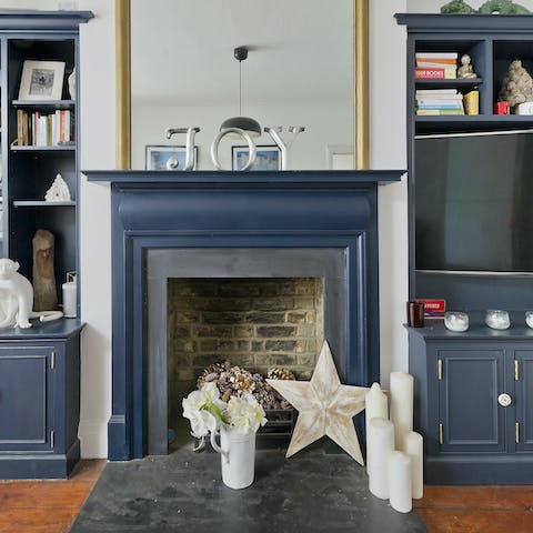 Admire your host's quirky trinkets and book collection in the lounge