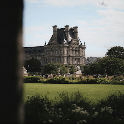 Travel ten minutes on the Metro to reach the Jardin des Tuileries and the Louvre