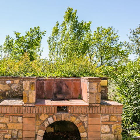 Cook up an alfresco feast on the brick-built barbecue