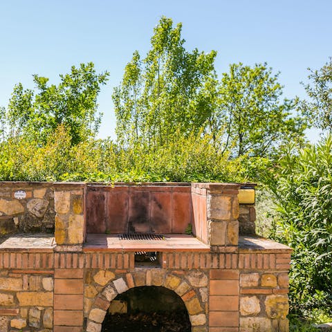 Cook up an alfresco feast on the brick-built barbecue