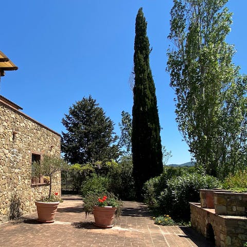 Make the most of the home's shared gardens and far-reaching rural views