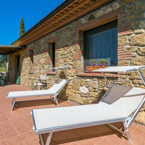 Read and relax on the sun loungers on your private terrace