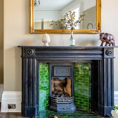 Light up the beautifully ornate fireplace and enjoy a hot mug of cocoa