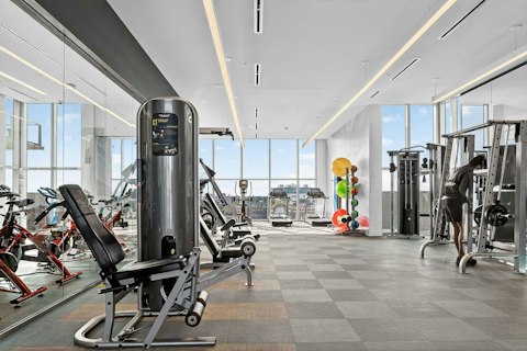 Train hard in the fully-equipped gym with city views