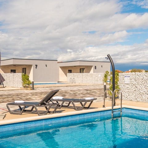 Splash into the private pool to beat the heat