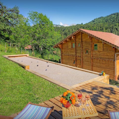 Play pétanque in the garden in summer