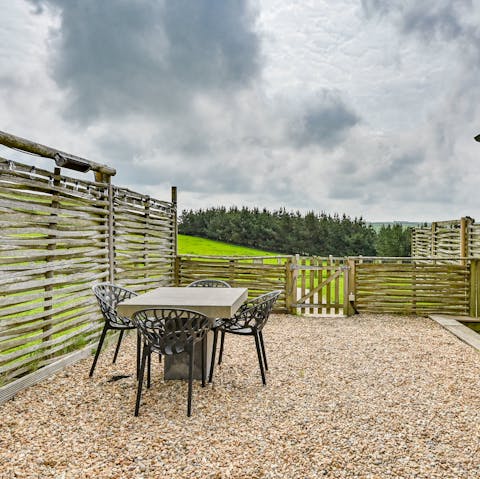 Enjoy an alfresco meal as you admire the rural views