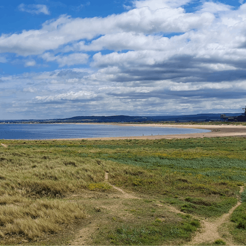Spend the afternoon on the sands of Redcar Beach, just across the street