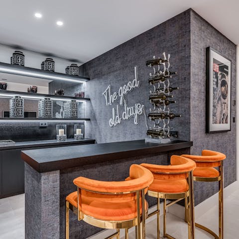 Crack open a bottle of wine in the games room