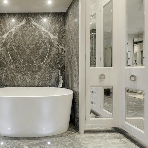 Enjoy a pre-dinner soak in the luxurious bath tub