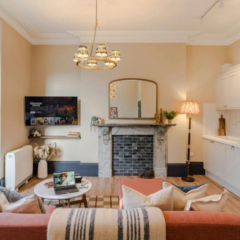 Enjoy a film or meal in the living area