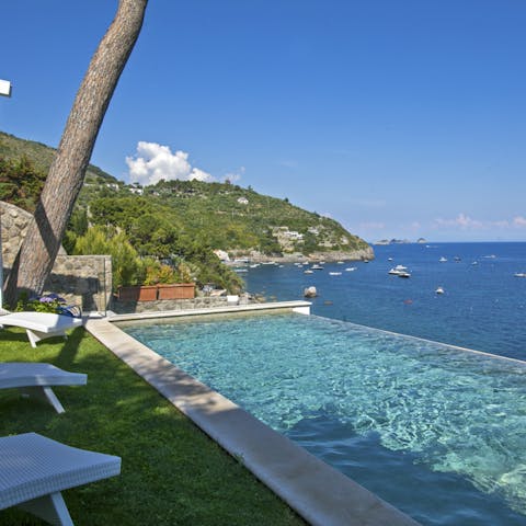 Unwind in this luxe infinity pool