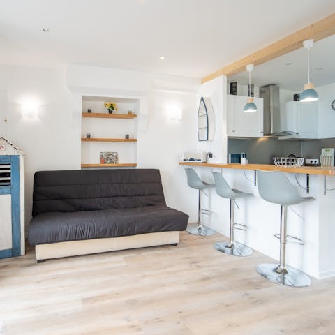 Stretch out in the living area after a day of discovering Normandy's attractions