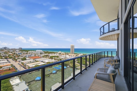 Relax on the scenic balcony as turquoise water stretches to the horizon