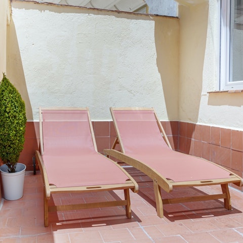 Work on your tan with a nap on the terrace