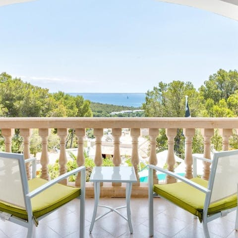 Take in scenic views over the Mediterranean Sea from the balcony